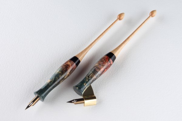 Set of pen holders made of maple burl and curly maple wood