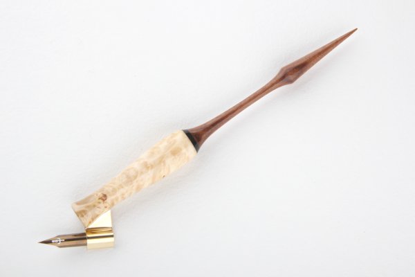 Pen holder made of stabilized maple burl, african ebony and pay ferro wood.